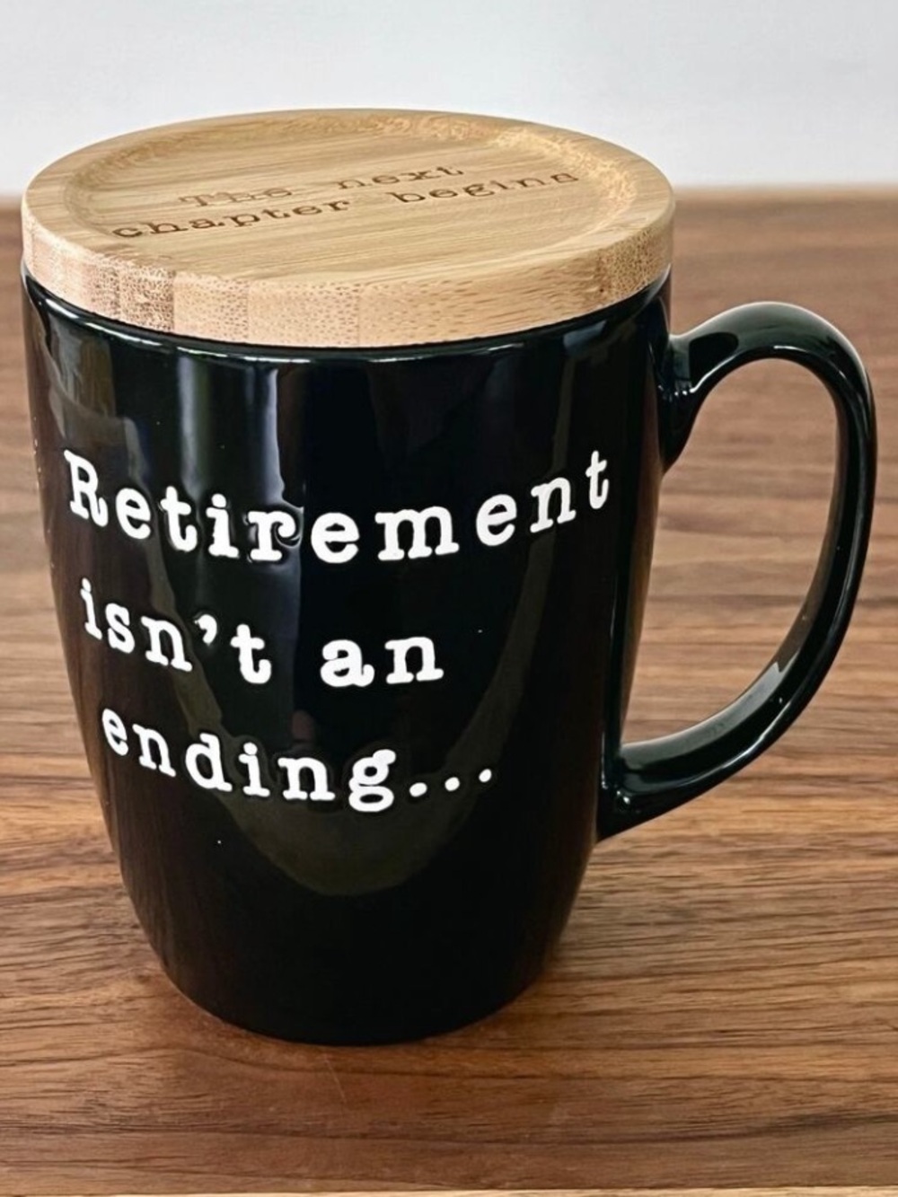 Our Name is Mud "Retirement Isn't an Ending" black stoneware coffee mug